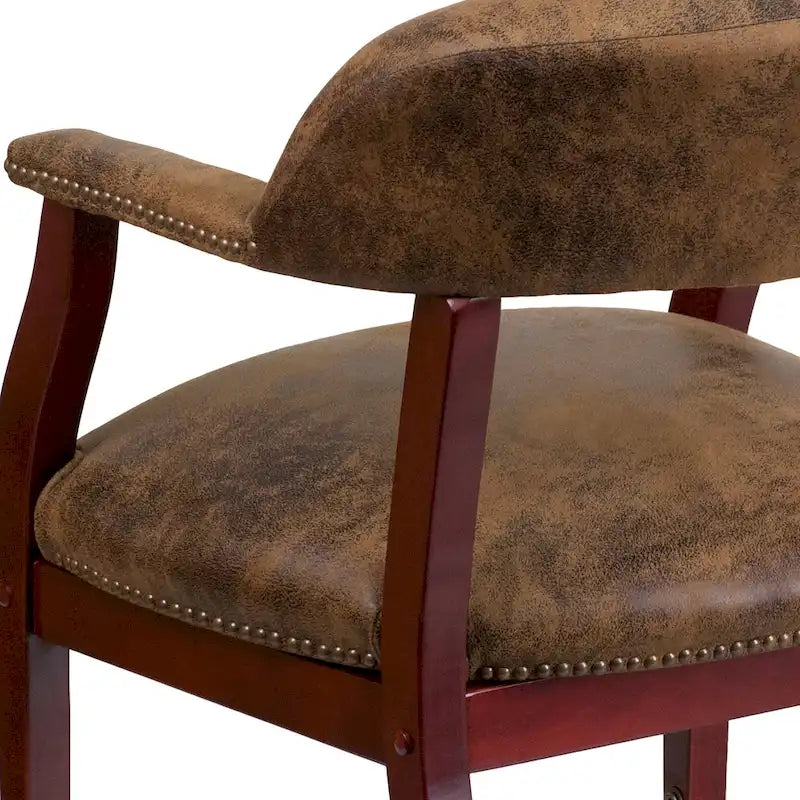 Fauteuil de conférence avec garniture cloutée et roulettes